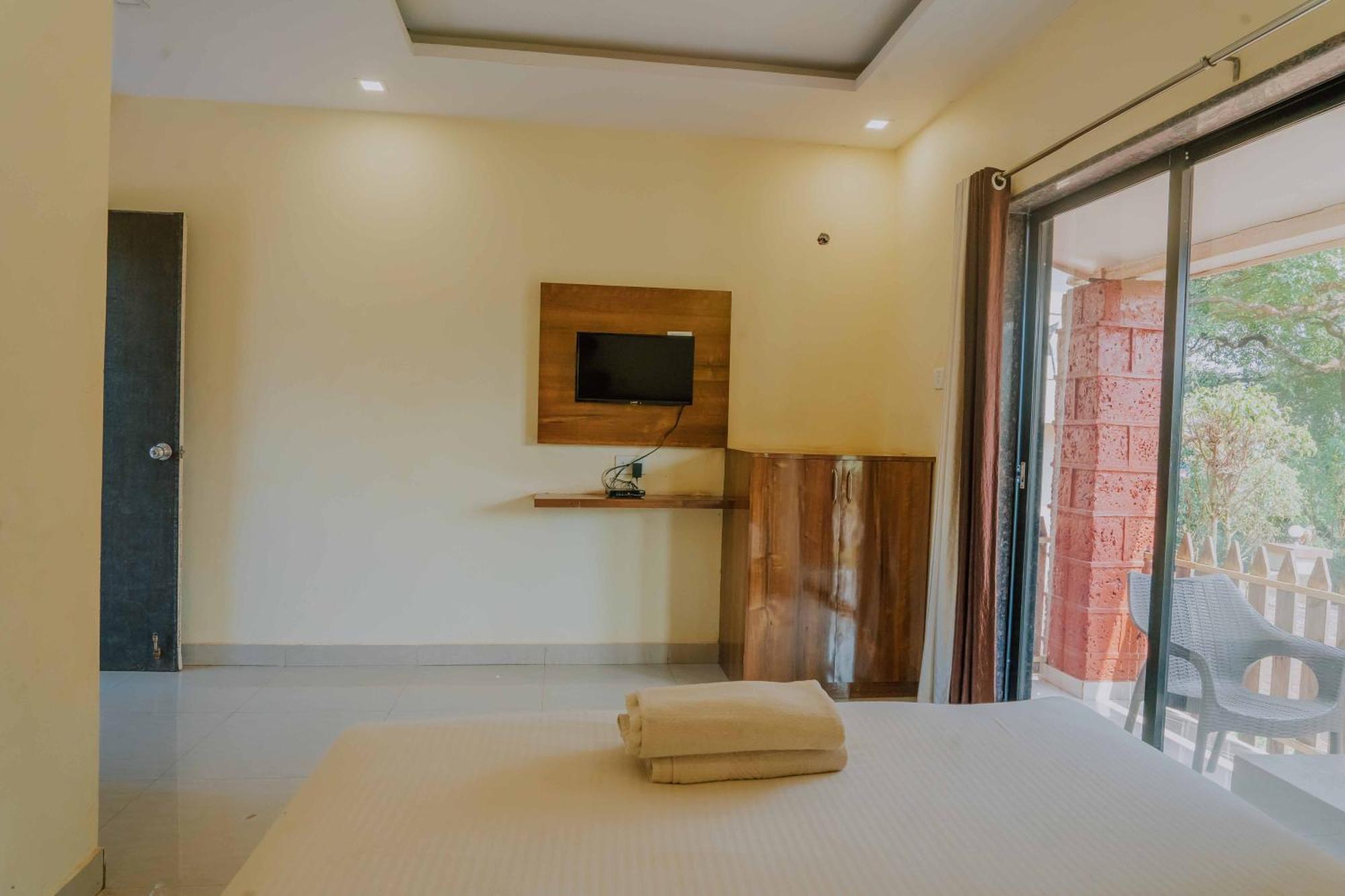 Hotel Oakwood マハバレシュワール 部屋 写真